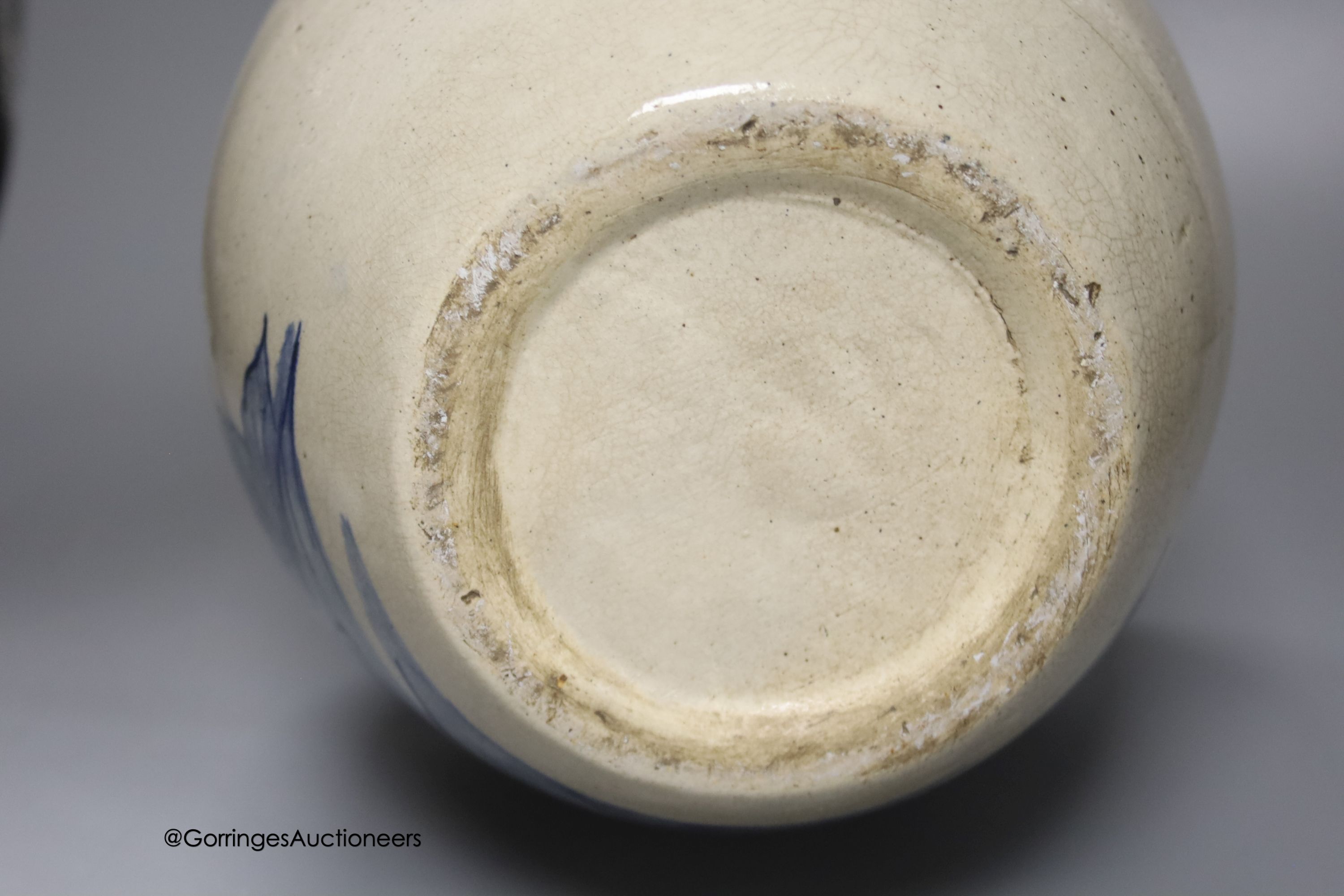 A tin-glazed terracotta barber's bowl dated 1819, a large ovoid eathenware ‘Taback’ jar and three earthenware jugs